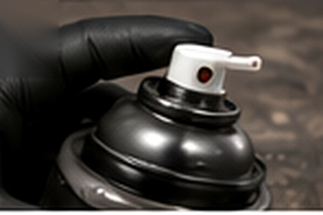 Clearing an aerosol nozzle after use and allowing the painted item to cure
